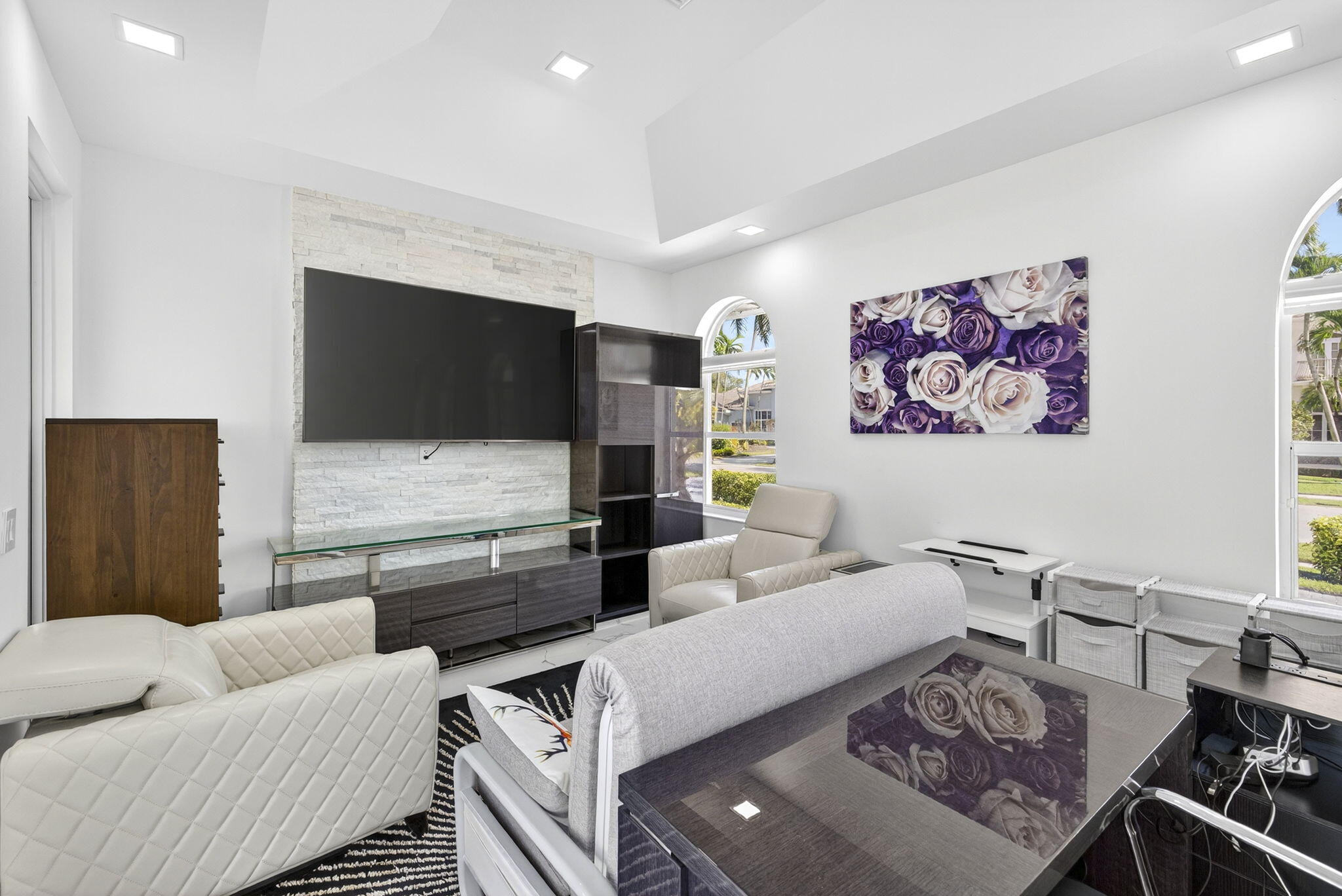 2673 Northwest 64th Boulevard Boca Raton, FL 33496 - Photo 37 of 64 a living room with furniture and a flat screen tv