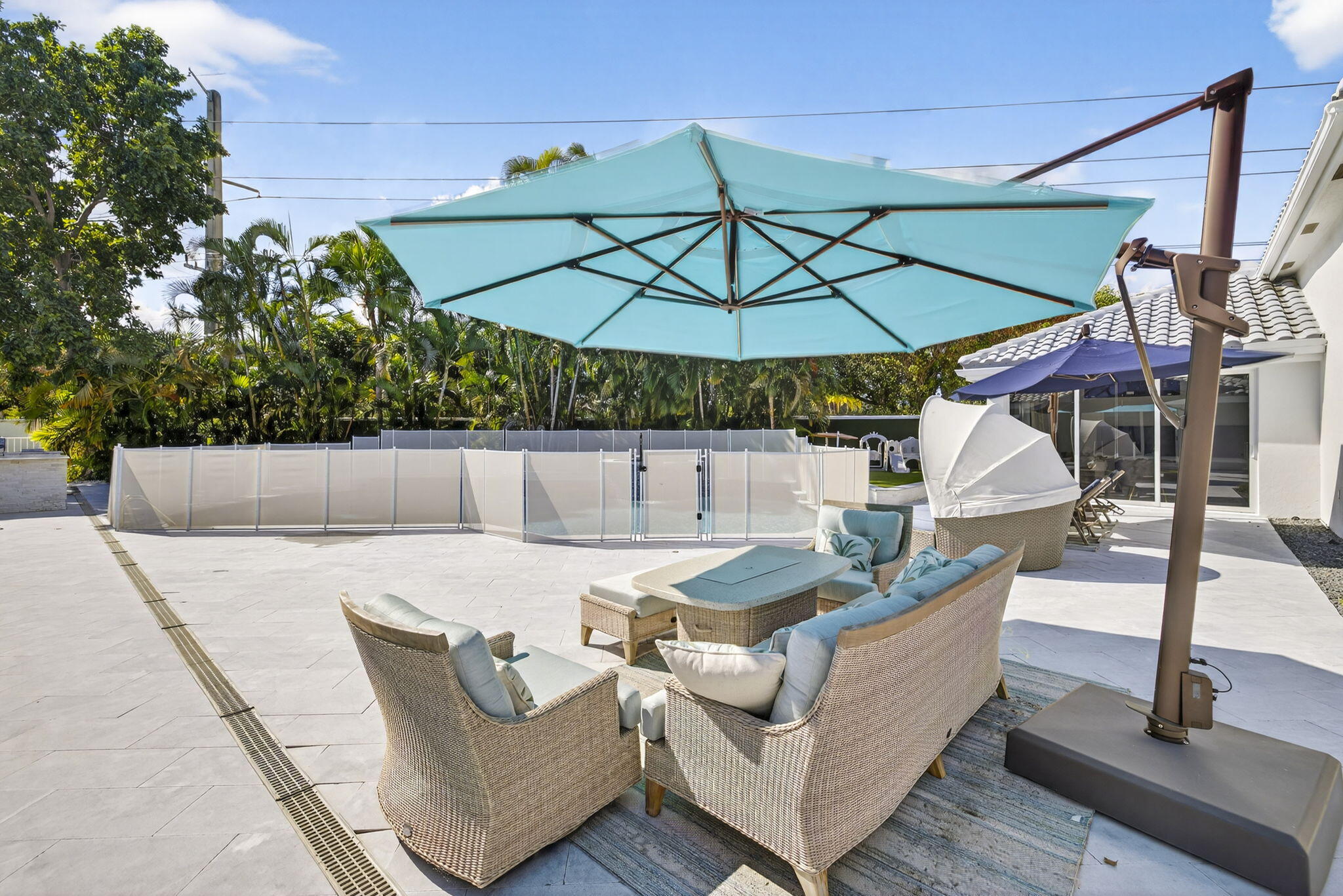 2673 Northwest 64th Boulevard Boca Raton, FL 33496 - Photo 45 of 64 swimming pool view with a seating space