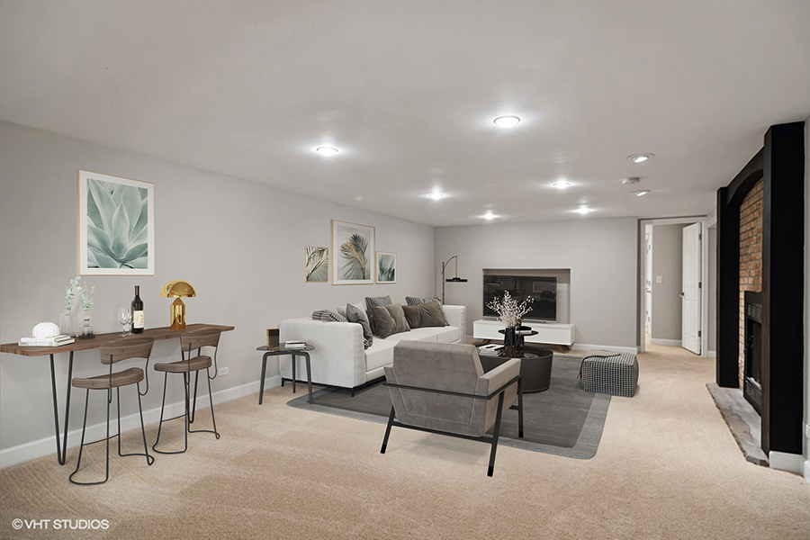 831 Ela Road Inverness, IL 60067 - Photo 12 of 25 a living room with furniture and a flat screen tv