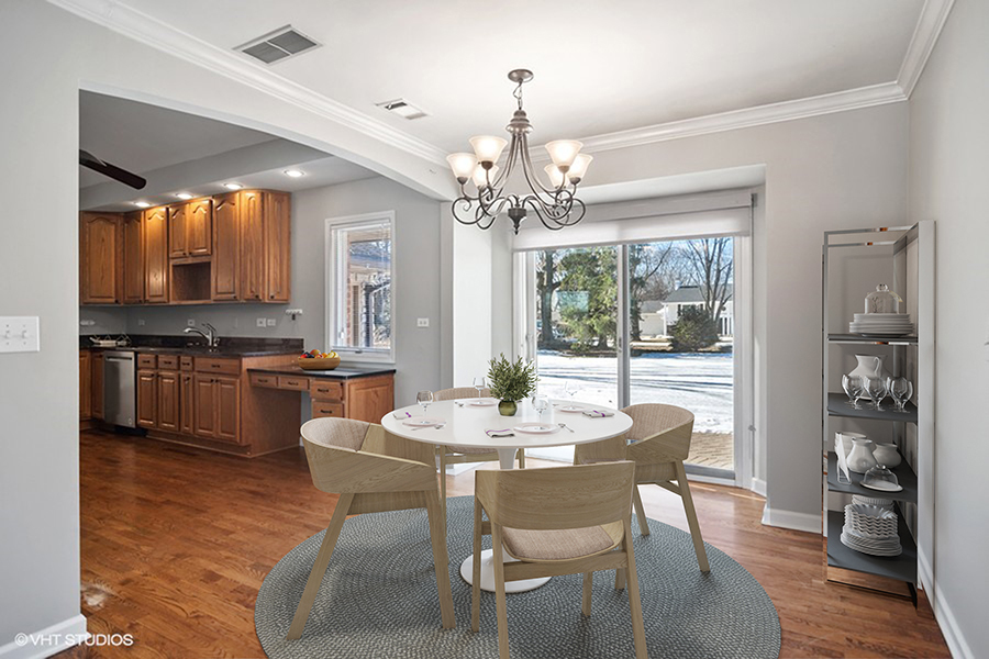 831 Ela Road Inverness, IL 60067 - Photo 5 of 25 a dining room with wooden floor a chandelier a wooden table and chairs