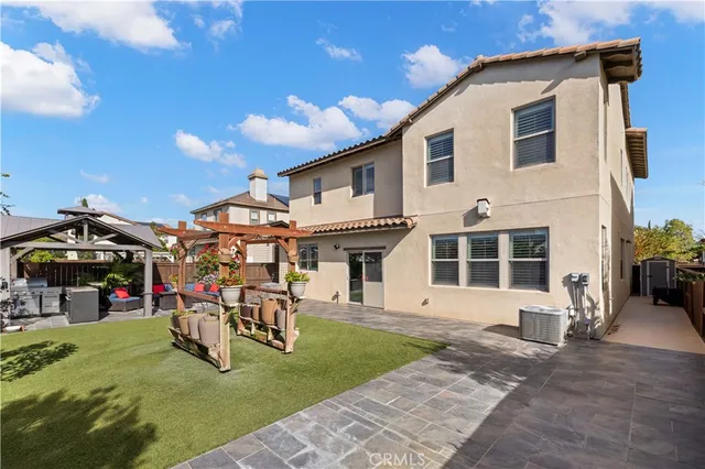 a view of a house with a patio