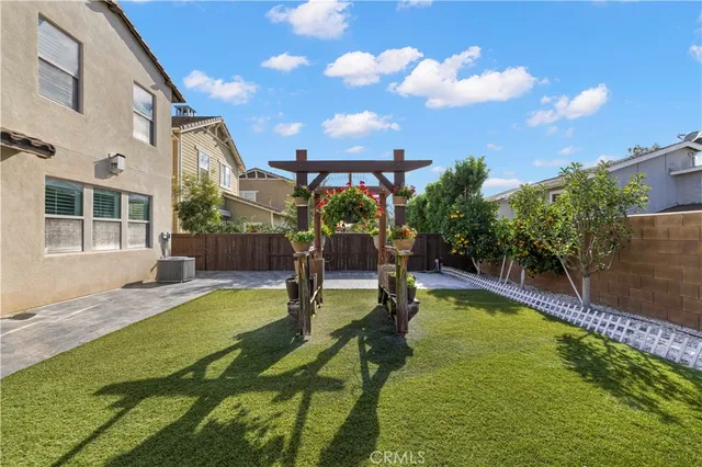 a swimming pool with some trees in the background