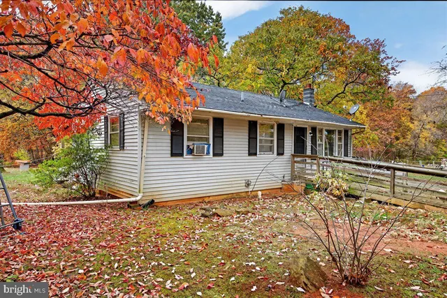 a house with trees in front of it