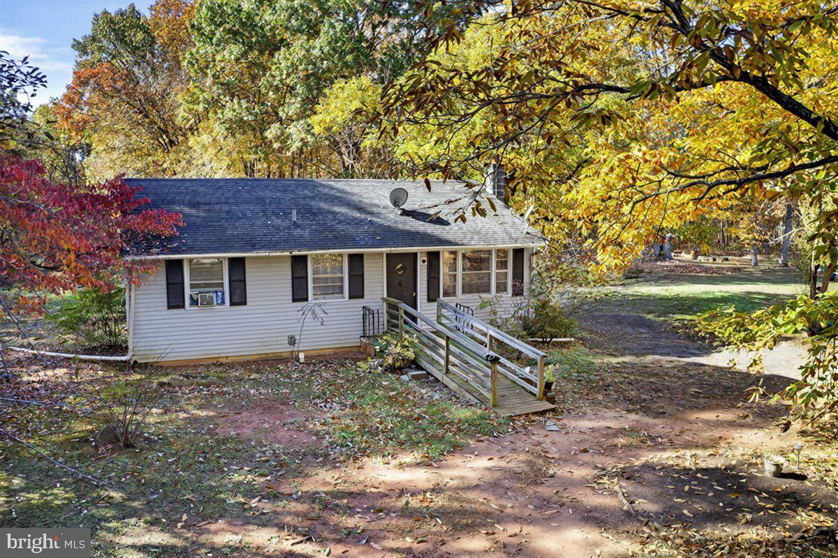 185 Smith Road Mineral, VA 23117 - Photo 19 of 26 a view of a house with a yard