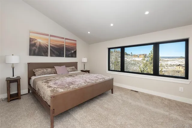 a view of a hallway with seating space