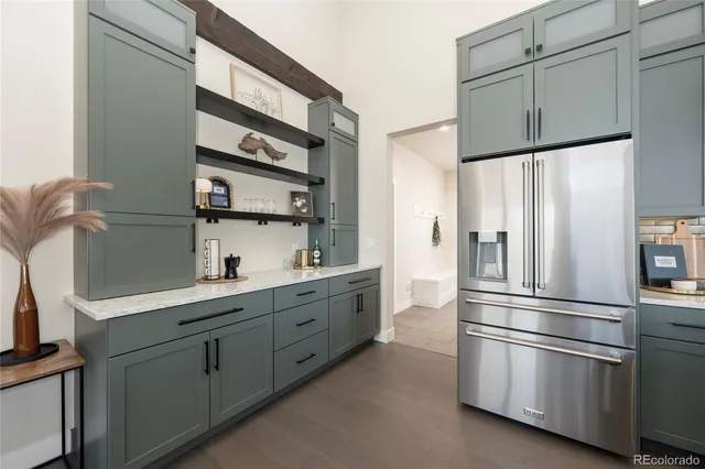 a bedroom with a bed and a lamp