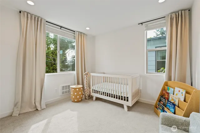 a room with a bed and a window