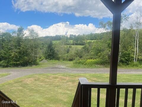 190 Wes Brown Road Cherry Valley, NY 13320 - Photo 8 of 38 Clouds from porch