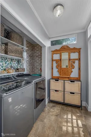 a kitchen with stainless steel appliances granite countertop a stove and a sink