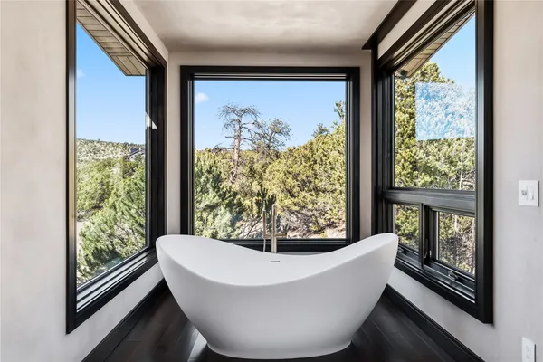 a workspace with furniture and window