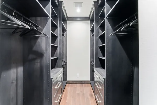 a bathroom with a toilet sink and shower