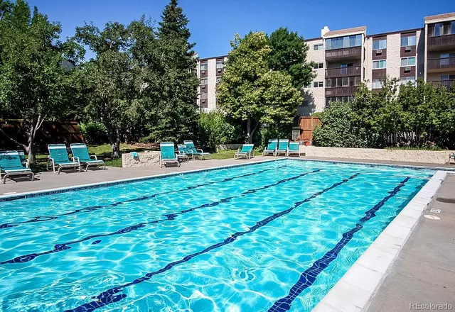 a room with furniture and air hockey table