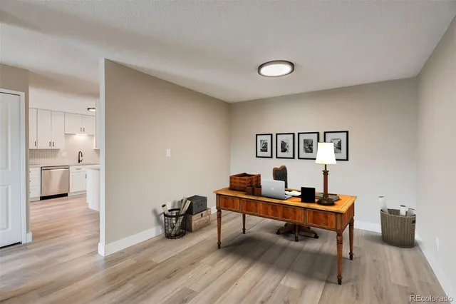 a room with furniture and wooden floor