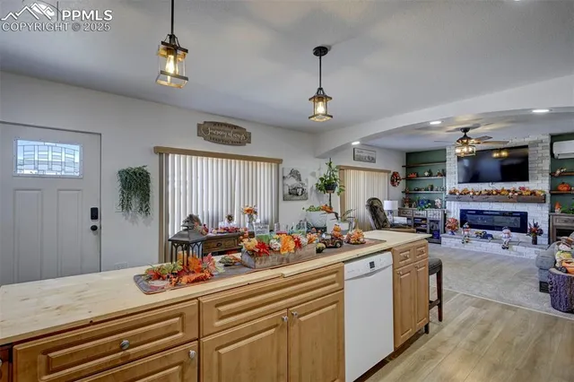 a kitchen and a refrigerator in a kitchen