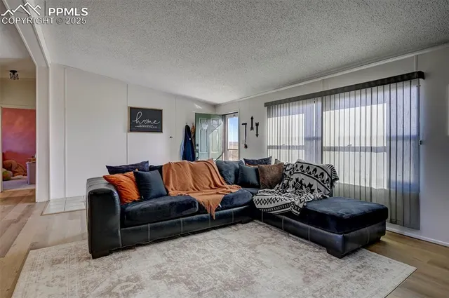 a living room with furniture and a couch