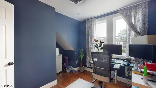 a view of a backyard with sitting area