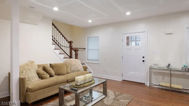 a living room with furniture and a table