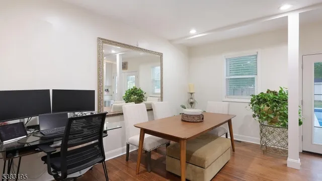 a kitchen with a table and chairs