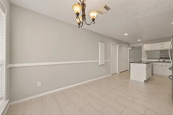 a view of storage and utility room with washer and dryer