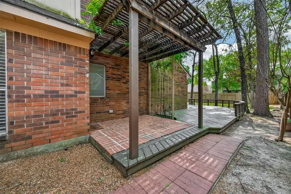 a view of a deck with a trees