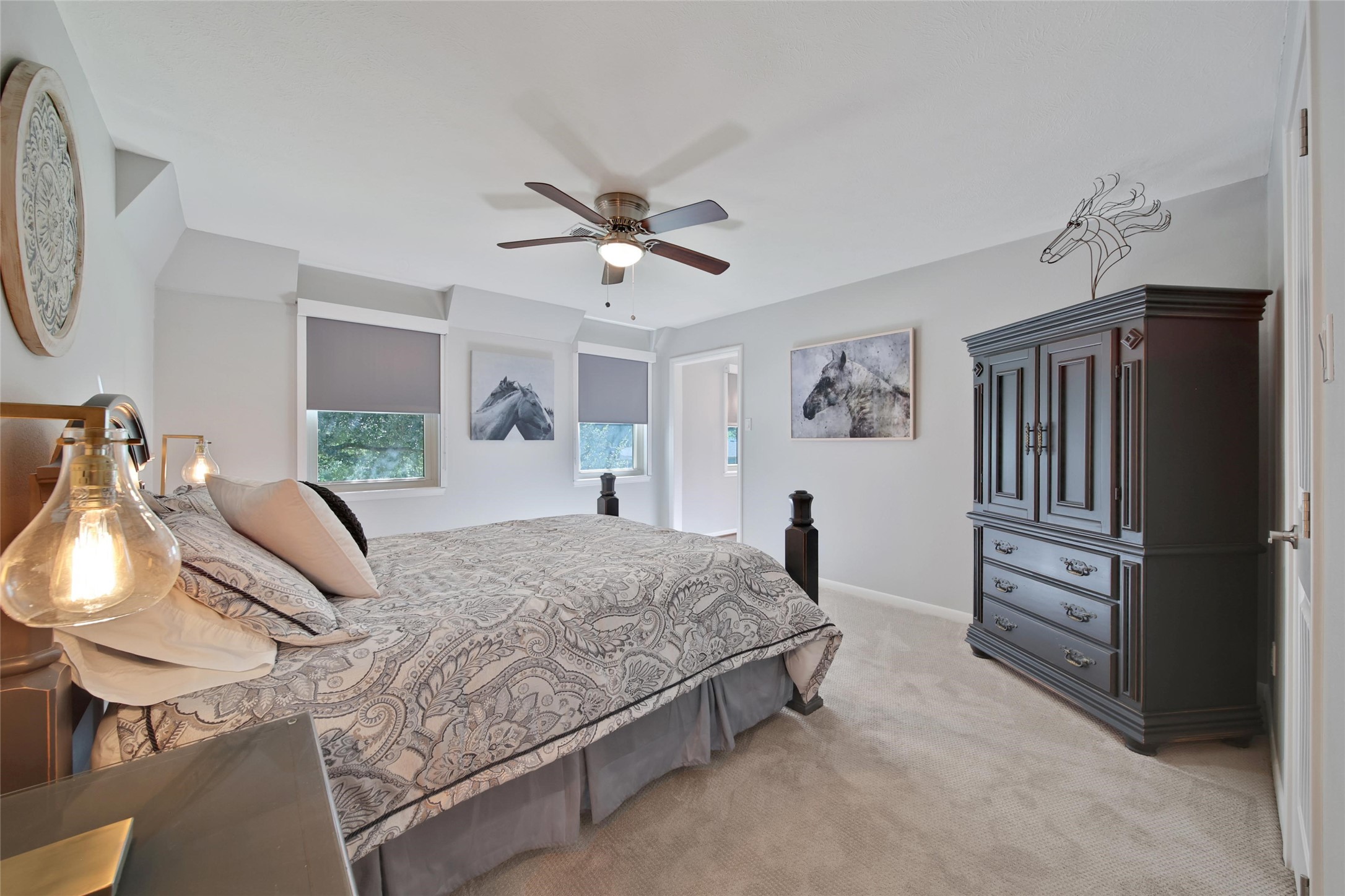 2902 Blue Lakes Lane Missouri City, TX 77459 - Photo 22 of 34 a bedroom with a bed dresser and a window