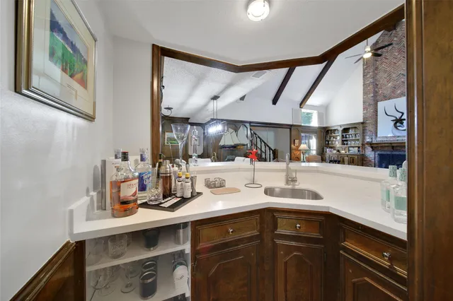 a kitchen with stainless steel appliances a sink and cabinets