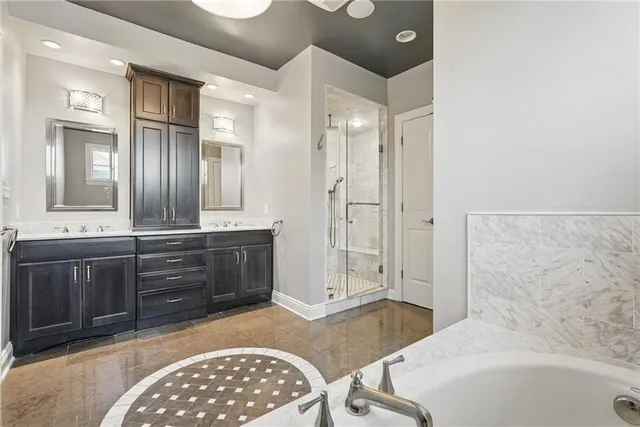 a bathroom with a sink a vanity and a mirror