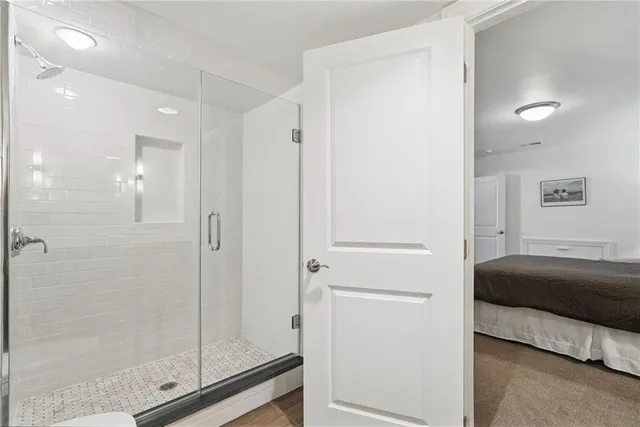 a view of a patio with table and chairs and potted plants