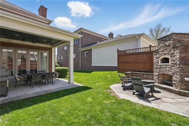 a patio with table and chairs