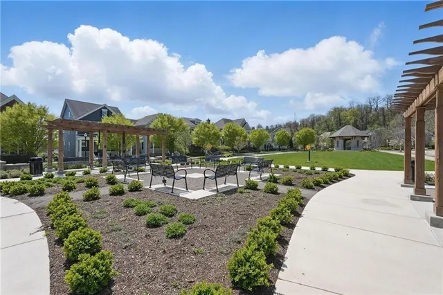 a view of a town with mountains in the background