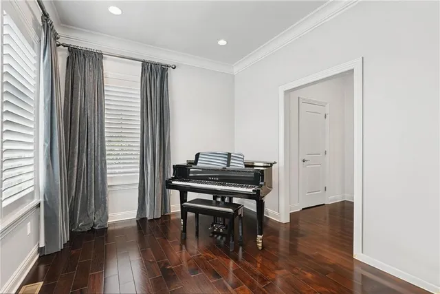 a view of kitchen with furniture stove and wooden floor