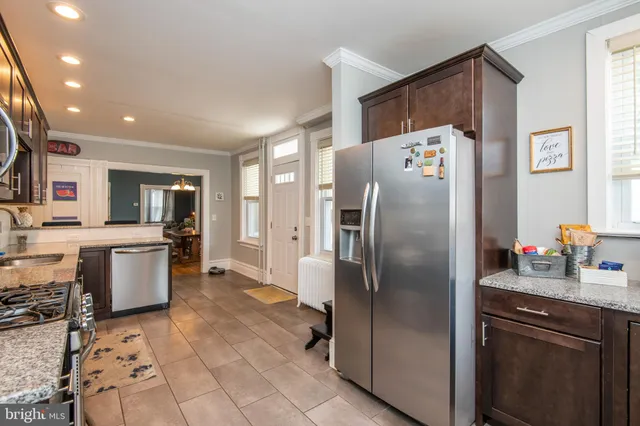 a kitchen with sink and window