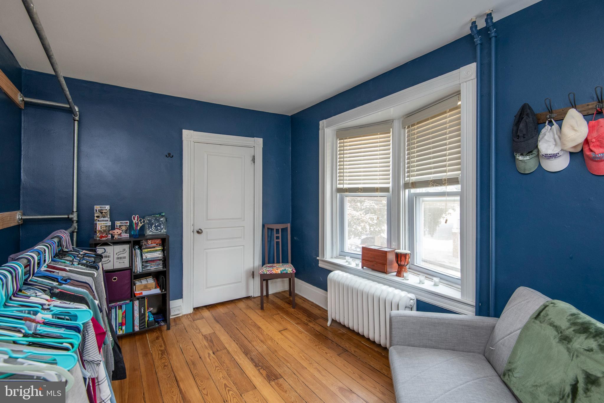 445 Nevin Street Lancaster, PA 17603 - Photo 29 of 53 a bedroom with furniture and a wooden floor