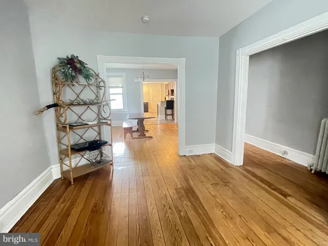 a kitchen with stainless steel appliances granite countertop a refrigerator and a stove