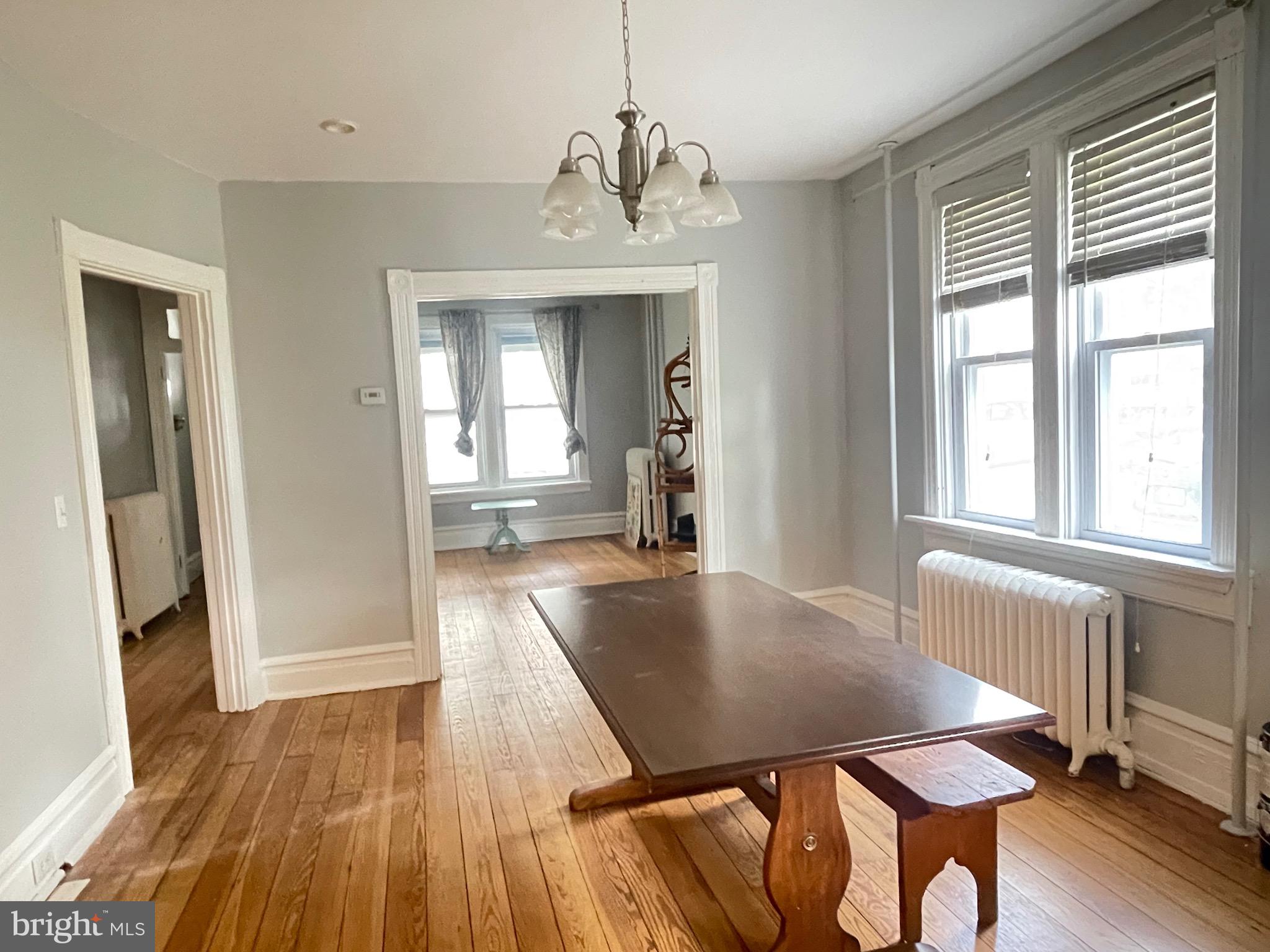445 Nevin Street Lancaster, PA 17603 - Photo 44 of 53 a view of a dining room with furniture window and wooden floor