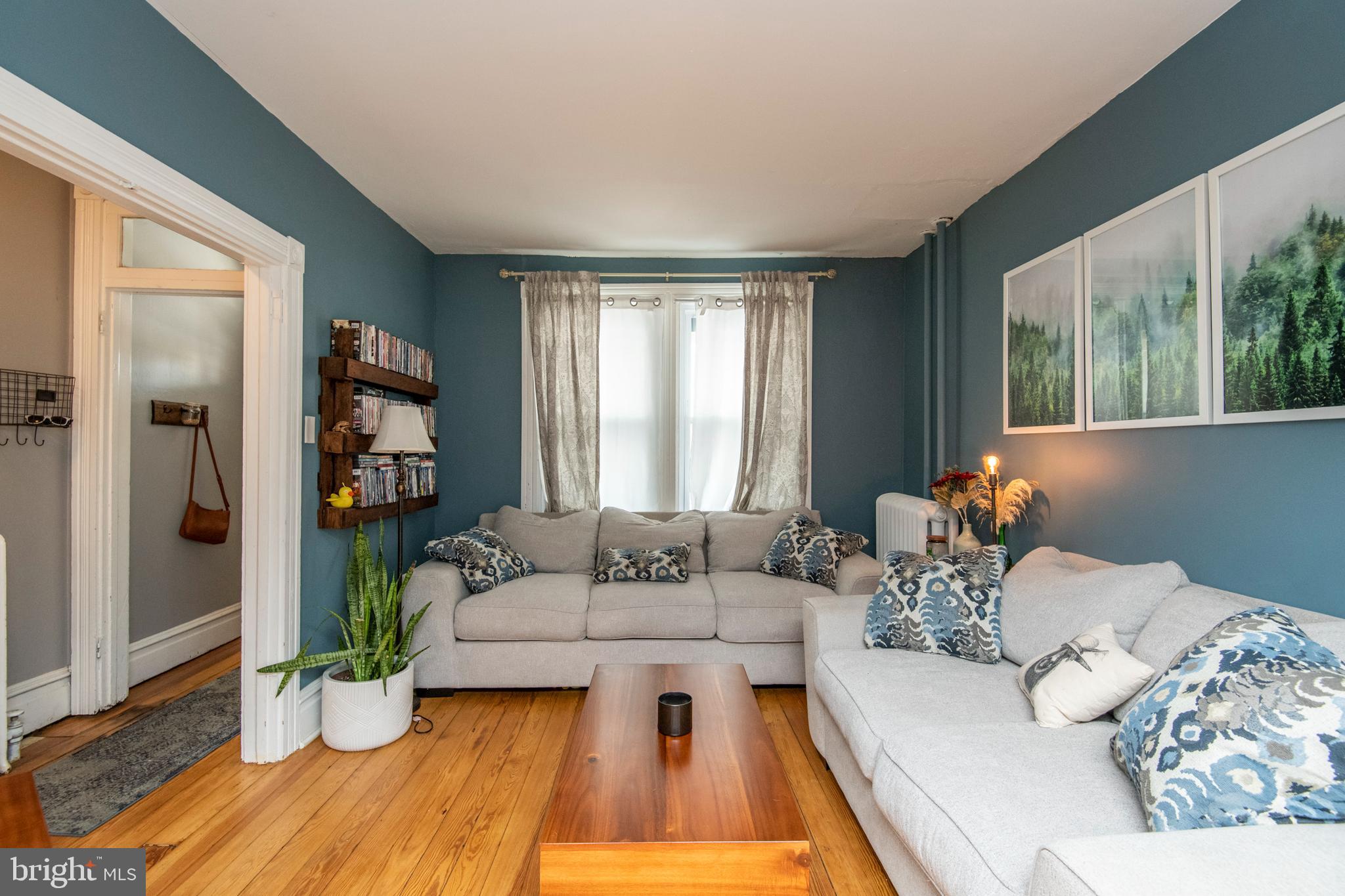 445 Nevin Street Lancaster, PA 17603 - Photo 6 of 53 a living room with furniture and a large window