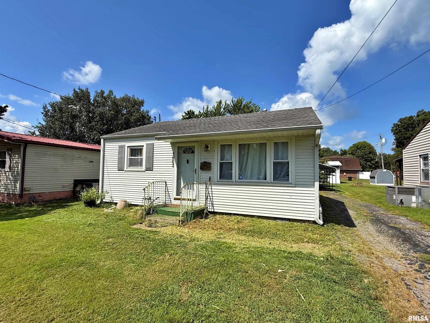 1603 Ferry Street Metropolis, IL 62960 - Photo 2 of 26 a view of a house with a yard porch and sitting area