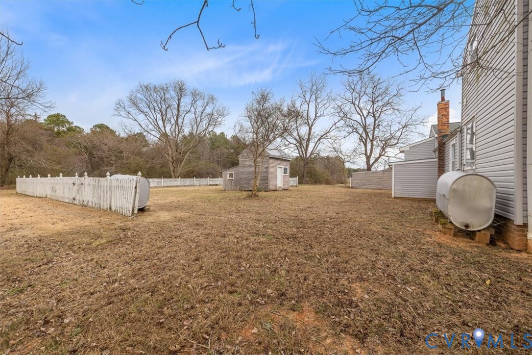 2297 Indian Oak Road Crewe, VA 23930 - Photo 39 of 49 a backyard of a house with table and chairs