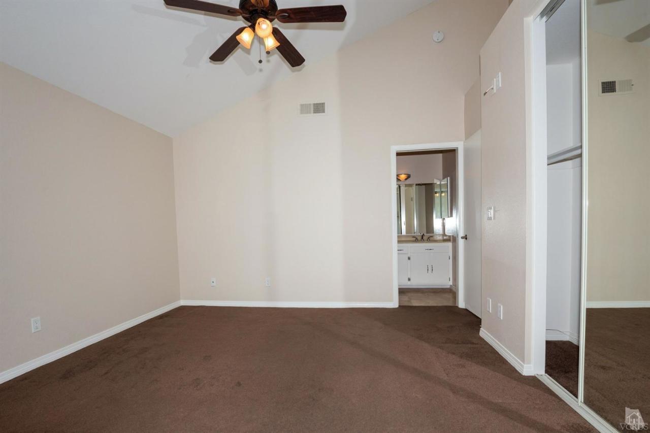 1940 Rory Lane, Unit 5 Simi Valley, CA 93063 - Photo 15 of 19 wooden floor in an empty room