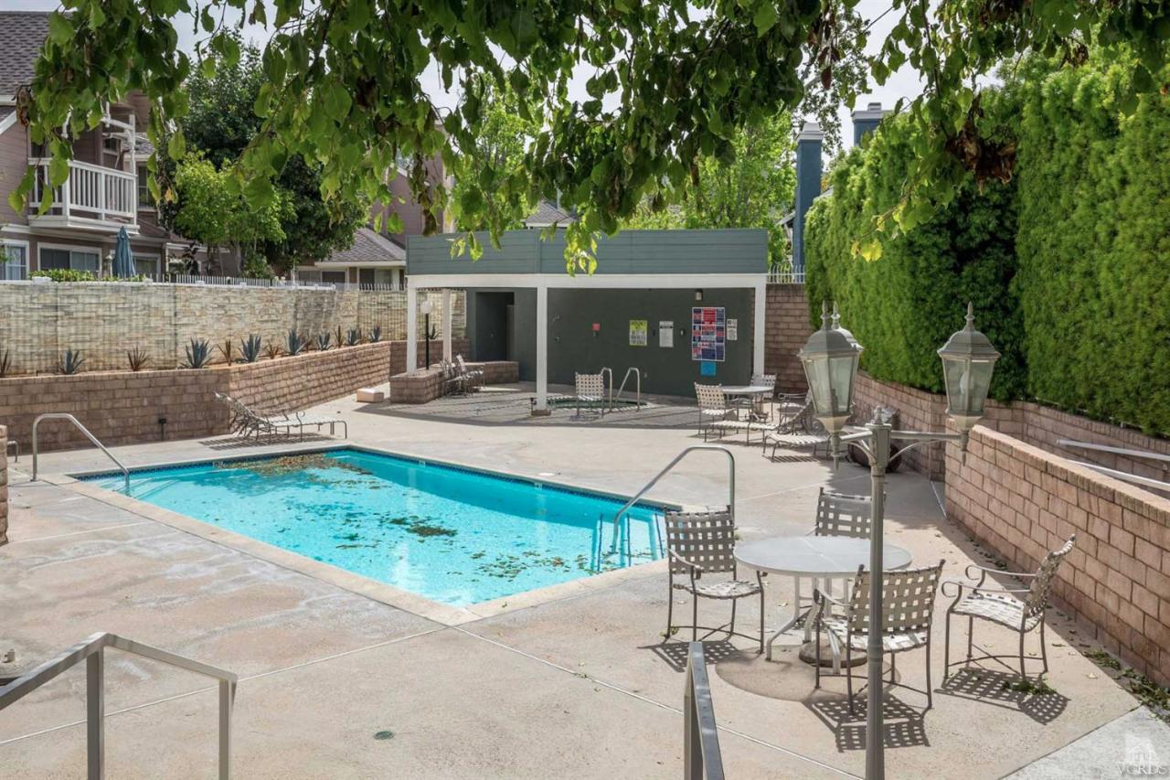1940 Rory Lane, Unit 5 Simi Valley, CA 93063 - Photo 16 of 19 a view of a house with backyard and sitting area
