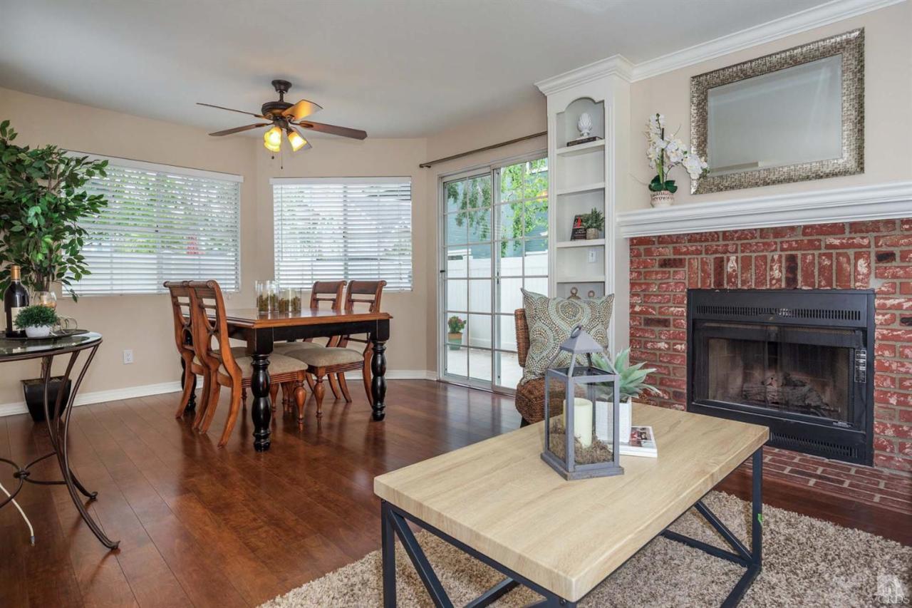 1940 Rory Lane, Unit 5 Simi Valley, CA 93063 - Photo 4 of 19 a view of a dining room with furniture window and wooden floor