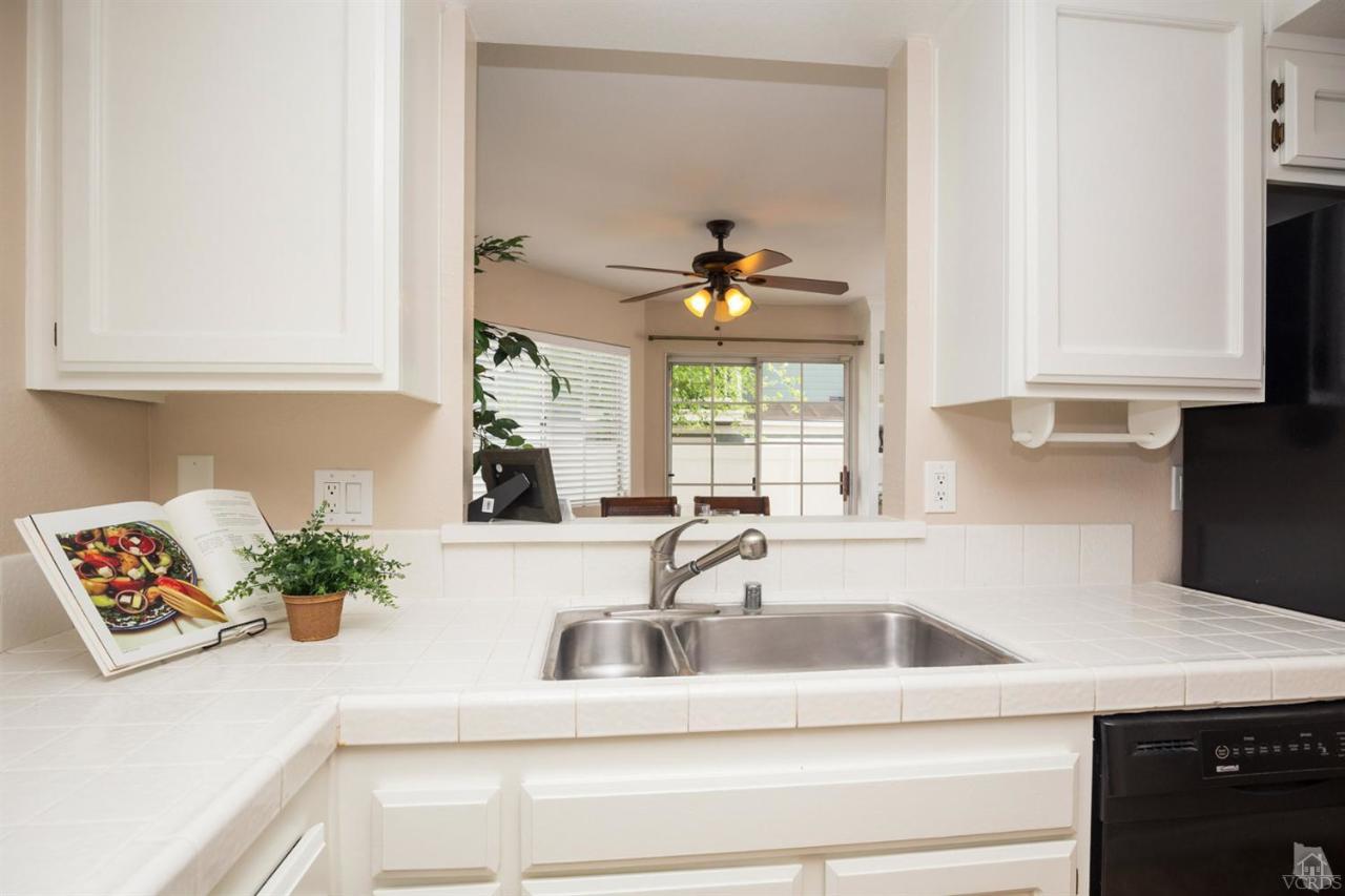 1940 Rory Lane, Unit 5 Simi Valley, CA 93063 - Photo 7 of 19 a kitchen with a sink and a window