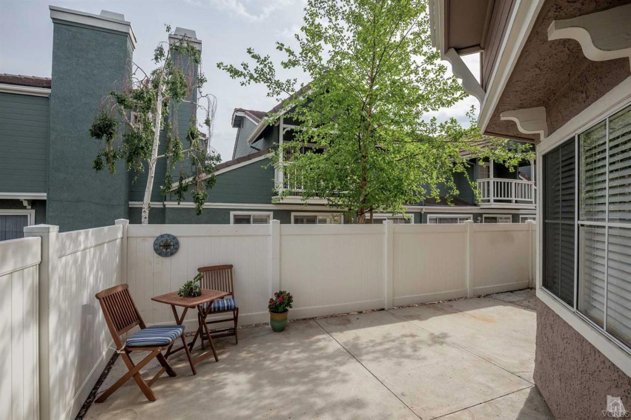 1940 Rory Lane, Unit 5 Simi Valley, CA 93063 - Photo 10 of 19 a view of a patio with table and chairs and potted plants