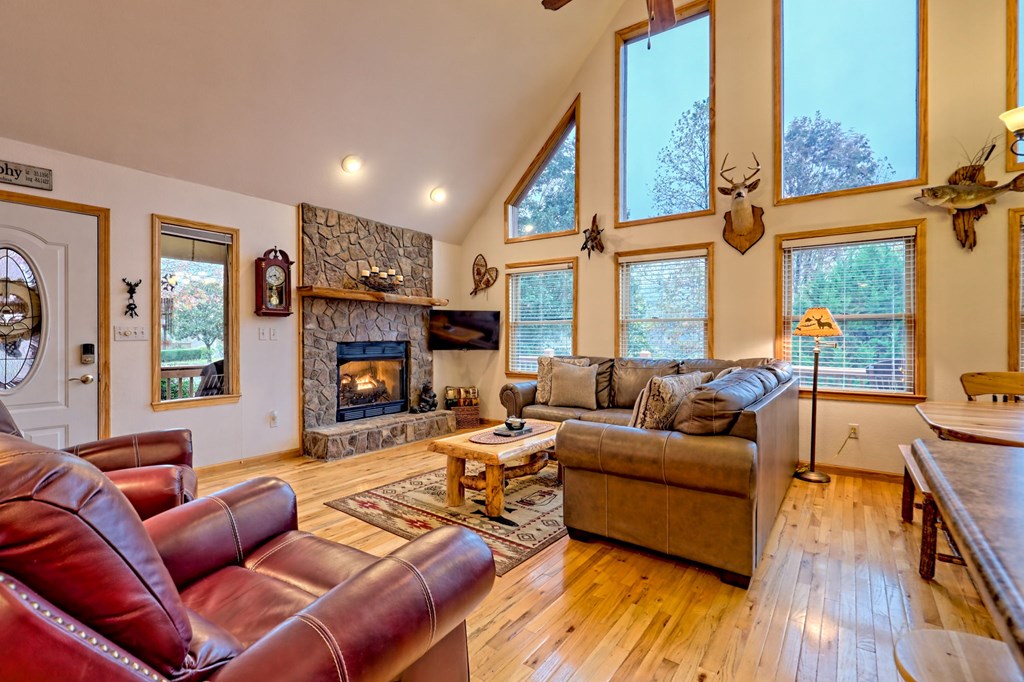36 Prairie Crossing Murphy, NC 28906 - Photo 12 of 71 a living room with furniture fireplace and a large window