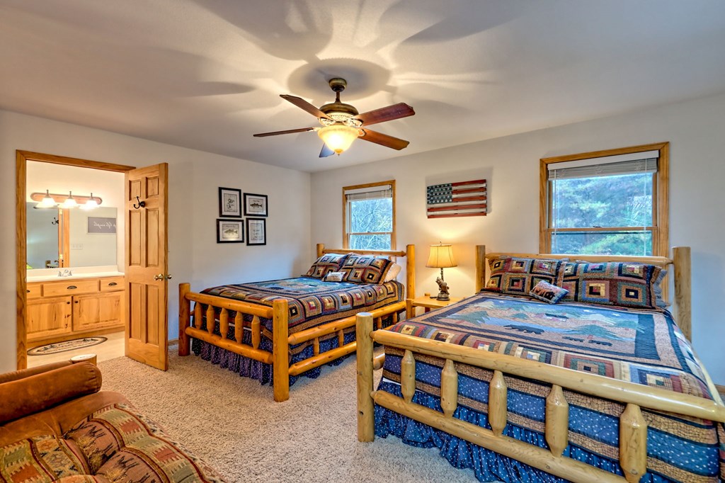 36 Prairie Crossing Murphy, NC 28906 - Photo 28 of 71 a living room with furniture ceiling fan and a window