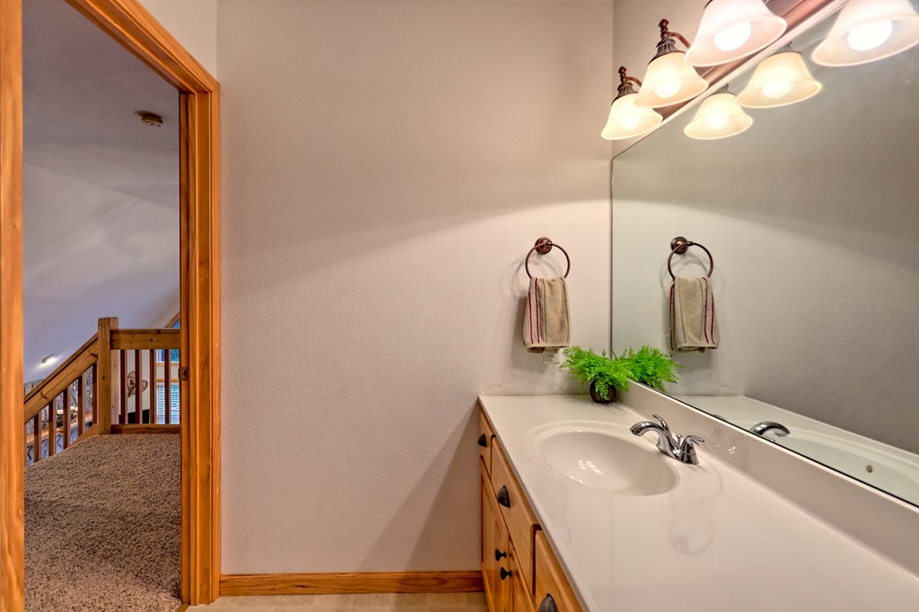 36 Prairie Crossing Murphy, NC 28906 - Photo 31 of 71 a bathroom with a sink and a mirror