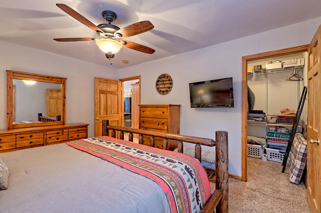 36 Prairie Crossing Murphy, NC 28906 - Photo 34 of 71 a bedroom with a bed and a flat screen tv