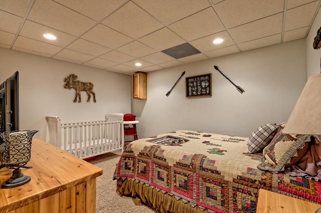 36 Prairie Crossing Murphy, NC 28906 - Photo 56 of 71 a bedroom with a bed and a table in it