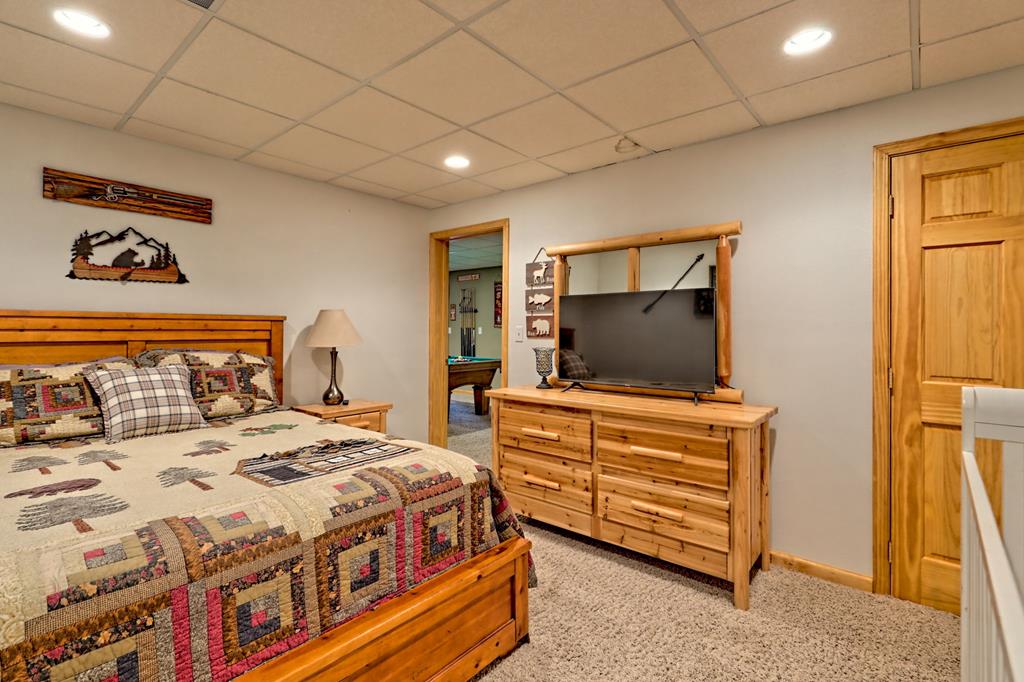 36 Prairie Crossing Murphy, NC 28906 - Photo 57 of 71 a bedroom with a bed and a television