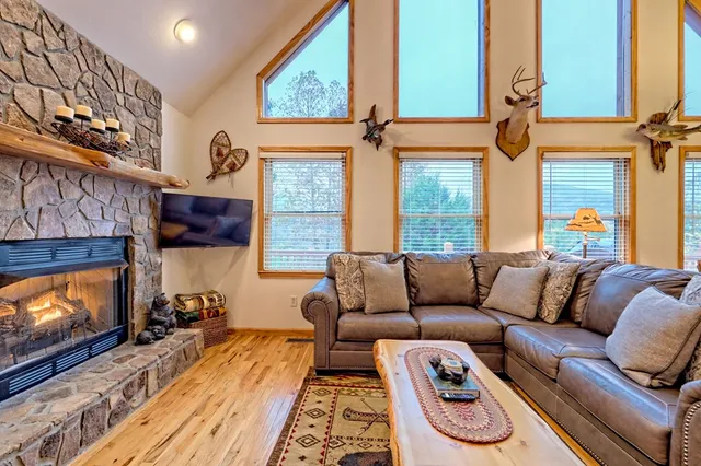 a bed room with a bed and a fireplace